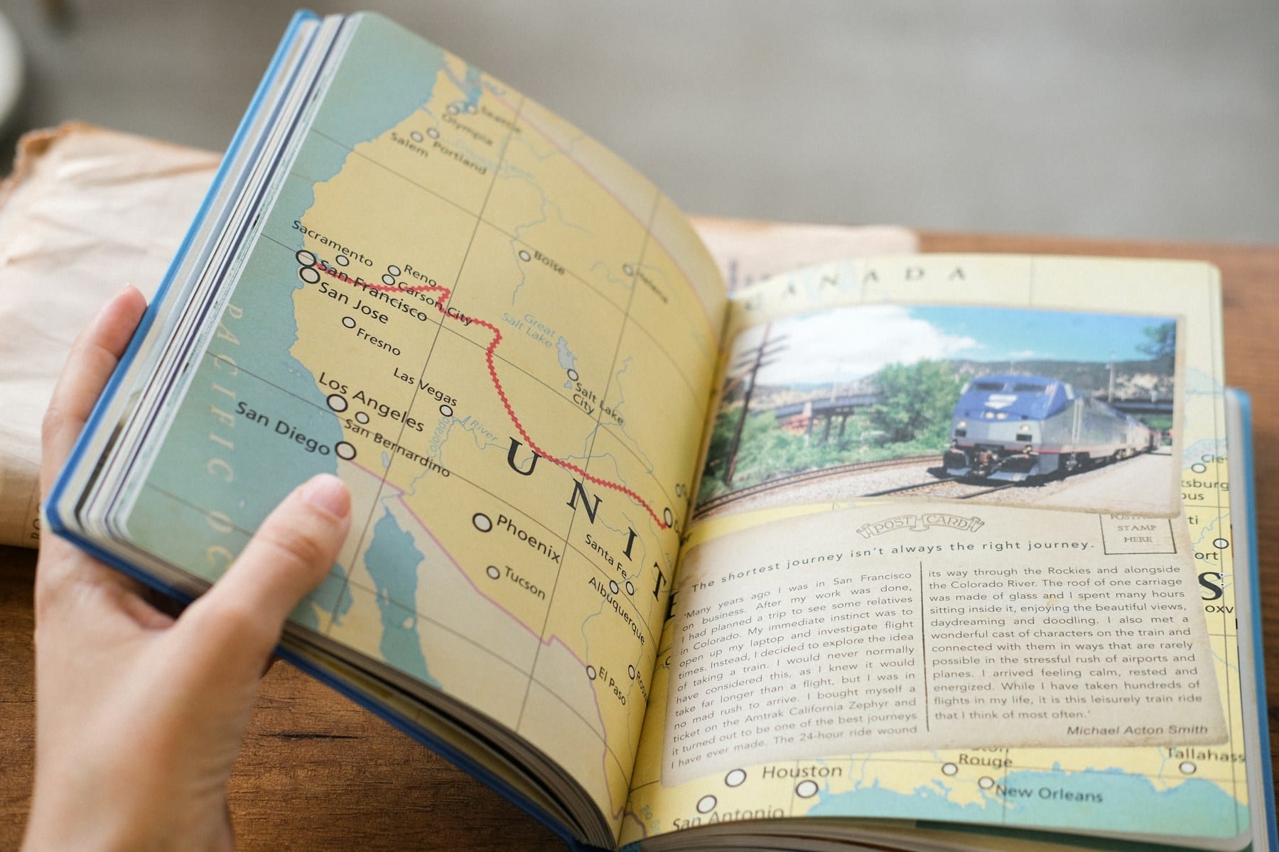 Open travel journal showing a hand-drawn route across a vintage map